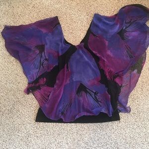 Sleeveless top with sheer overlay